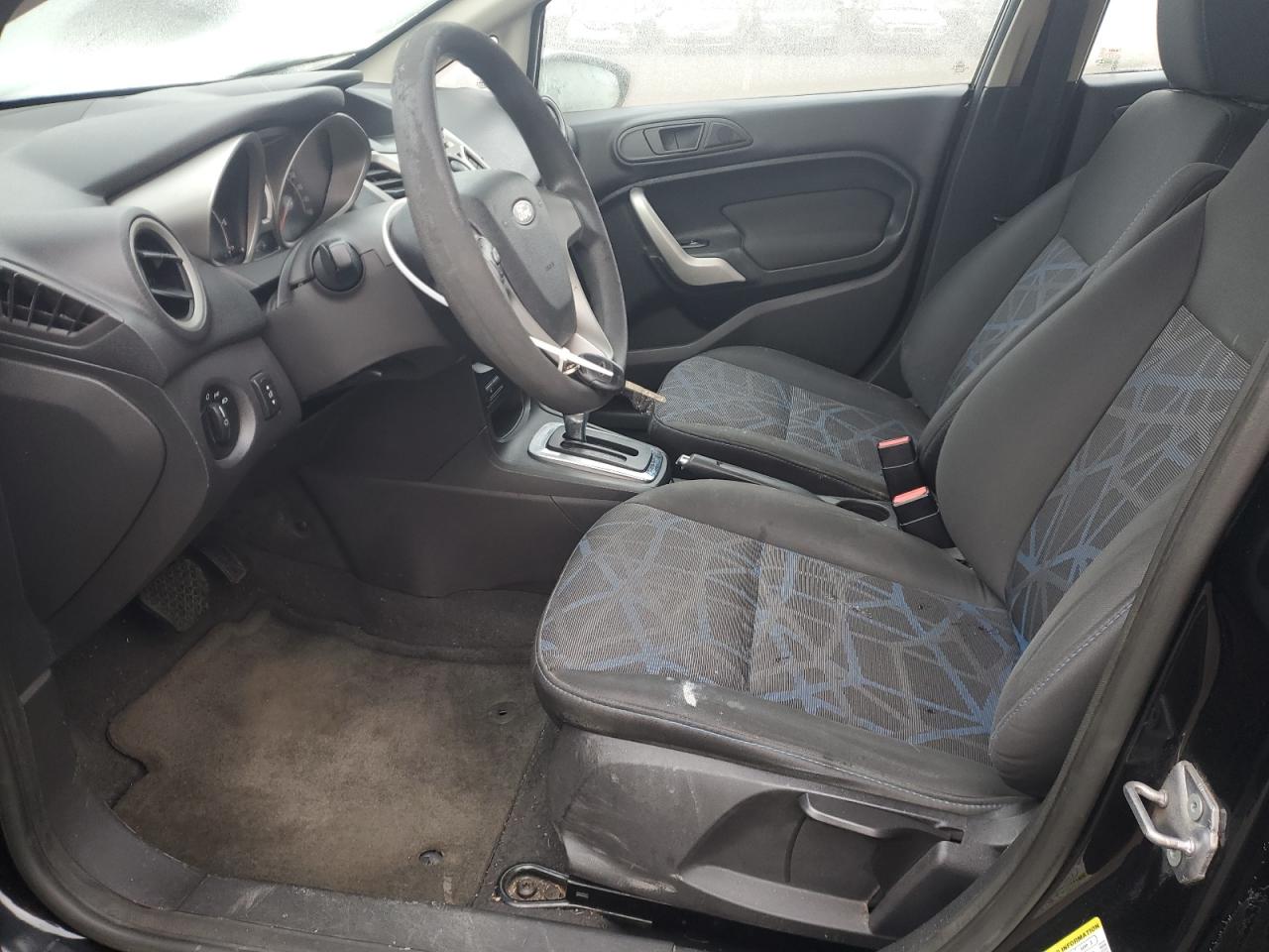 2012 Ford Fiesta VIN 3FADP4EJ8CM115670 Copart auction photo, front end / side damage thumbnail 7
