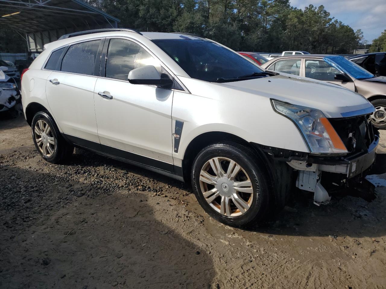 2012 Cadillac SRX VIN 3GYFNGE36CS546767 Copart auction photo, front end damage thumbnail 4