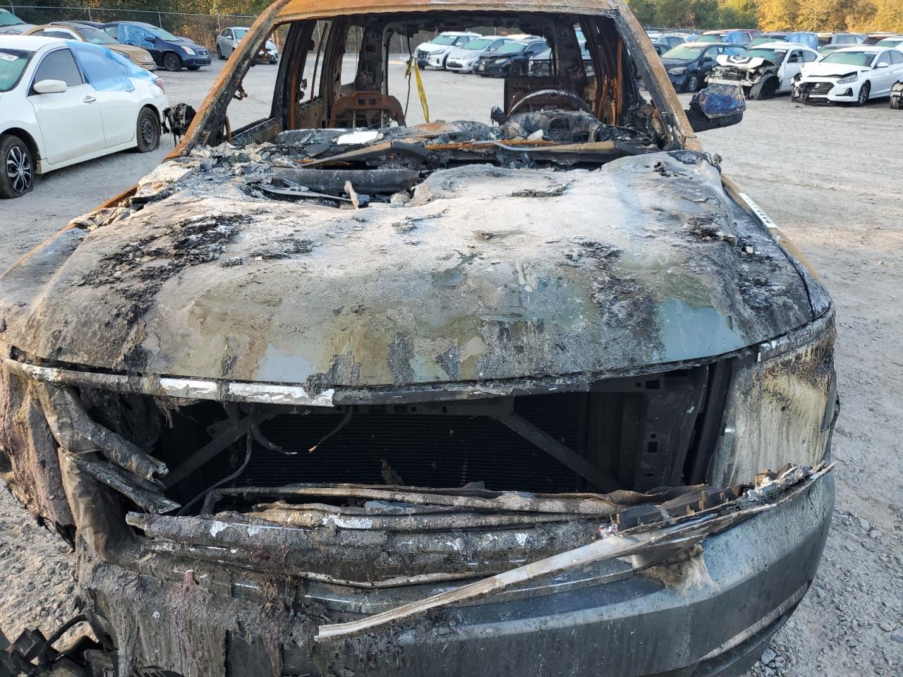 2016 Chevrolet Tahoe VIN 1GNSKCKC9GR268909 Copart auction photo, burn damage thumbnail 12