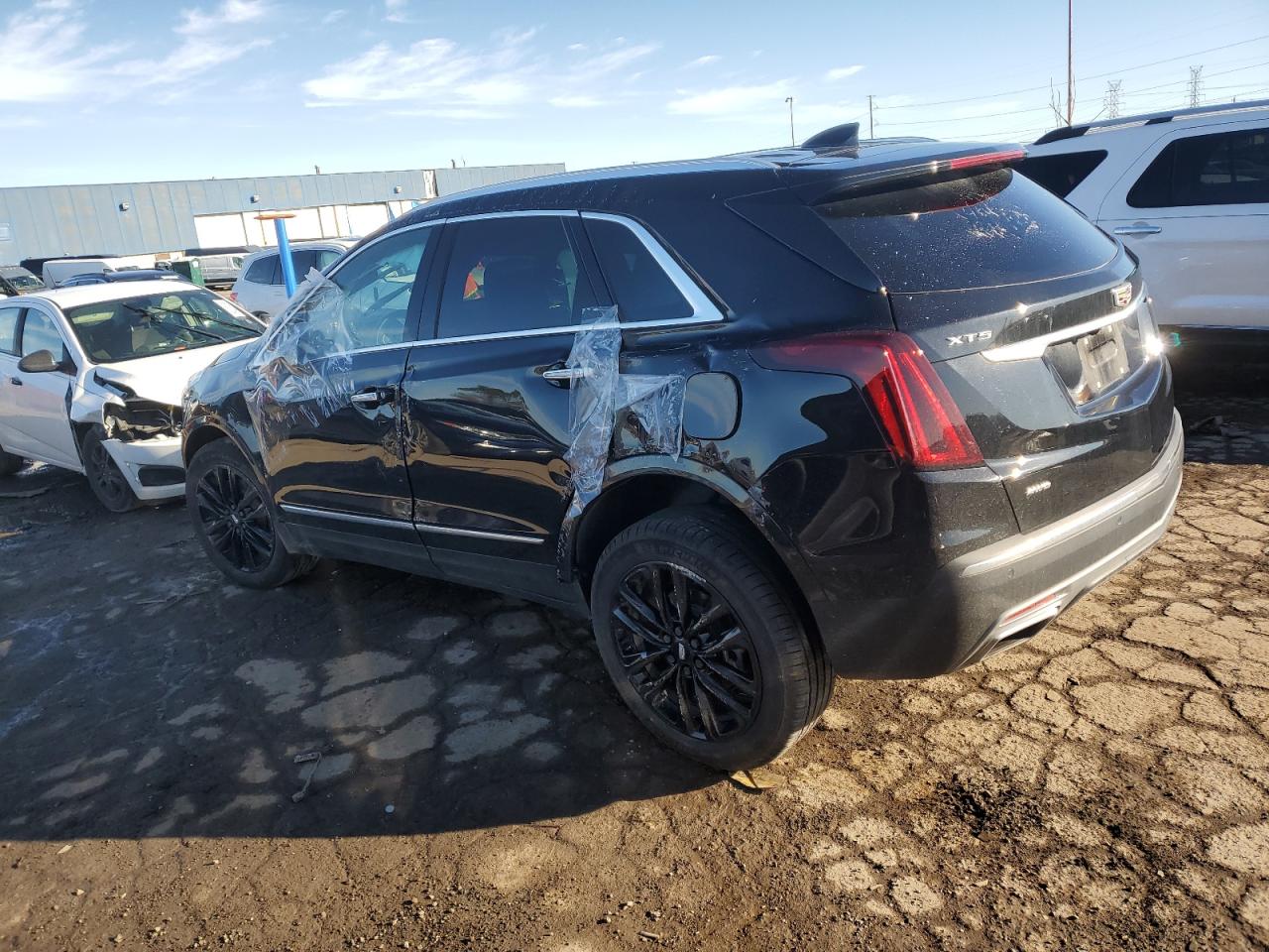 2022 Cadillac XT5 VIN 1GYKNDRS7NZ164512 Copart auction photo, all over damage thumbnail 2