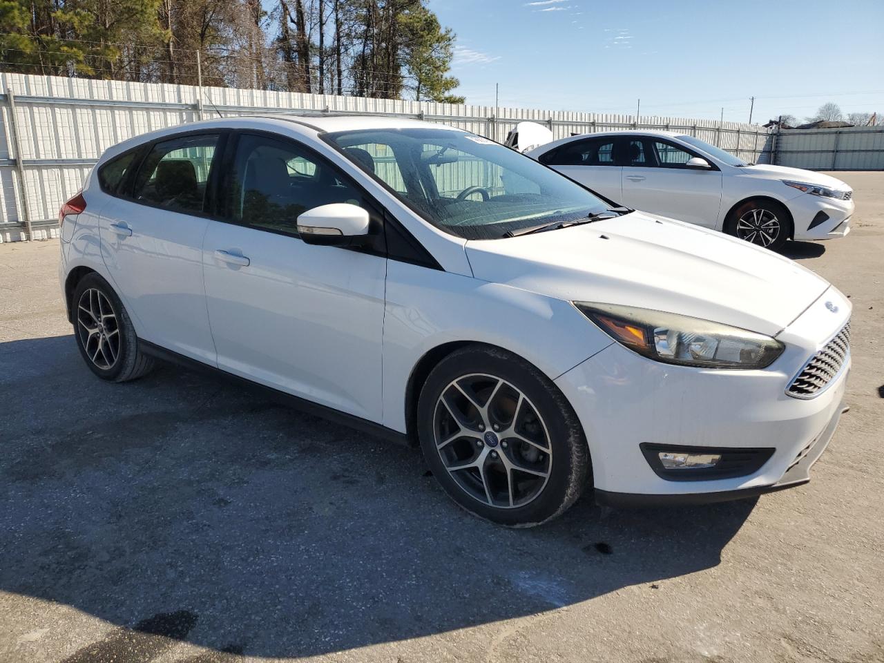 2017 Ford Focus VIN 1FADP3M23HL282659 Copart auction photo, undercarriage damage thumbnail 4