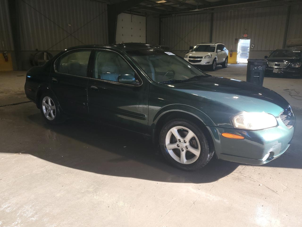 2000 Nissan Maxima VIN JN1CA31D1YT745348 Copart auction photo, minor dent/scratches damage thumbnail 4