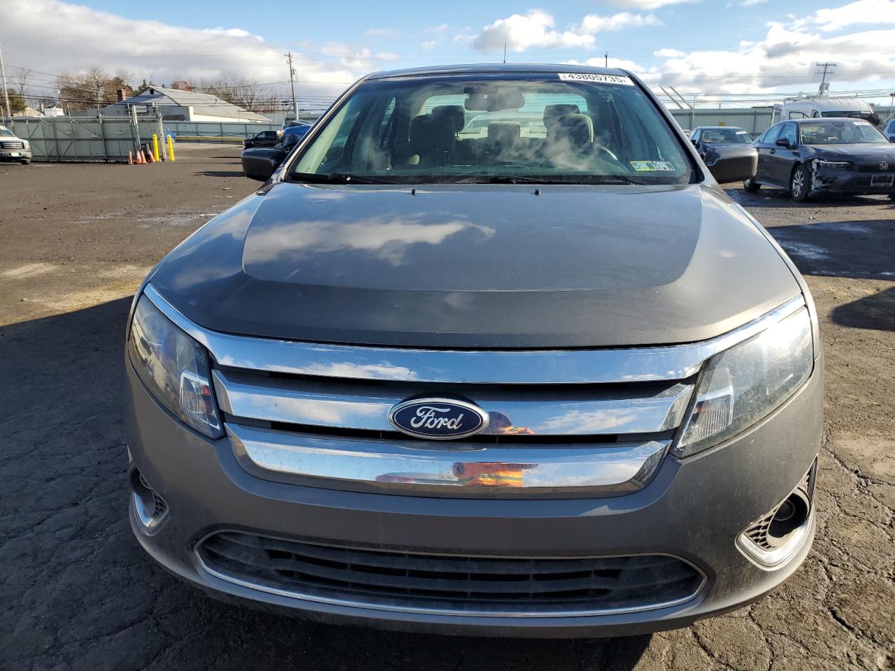 2011 Ford Fusion VIN 3FADP0L35BR131534 Copart auction photo, side / rear end damage thumbnail 5