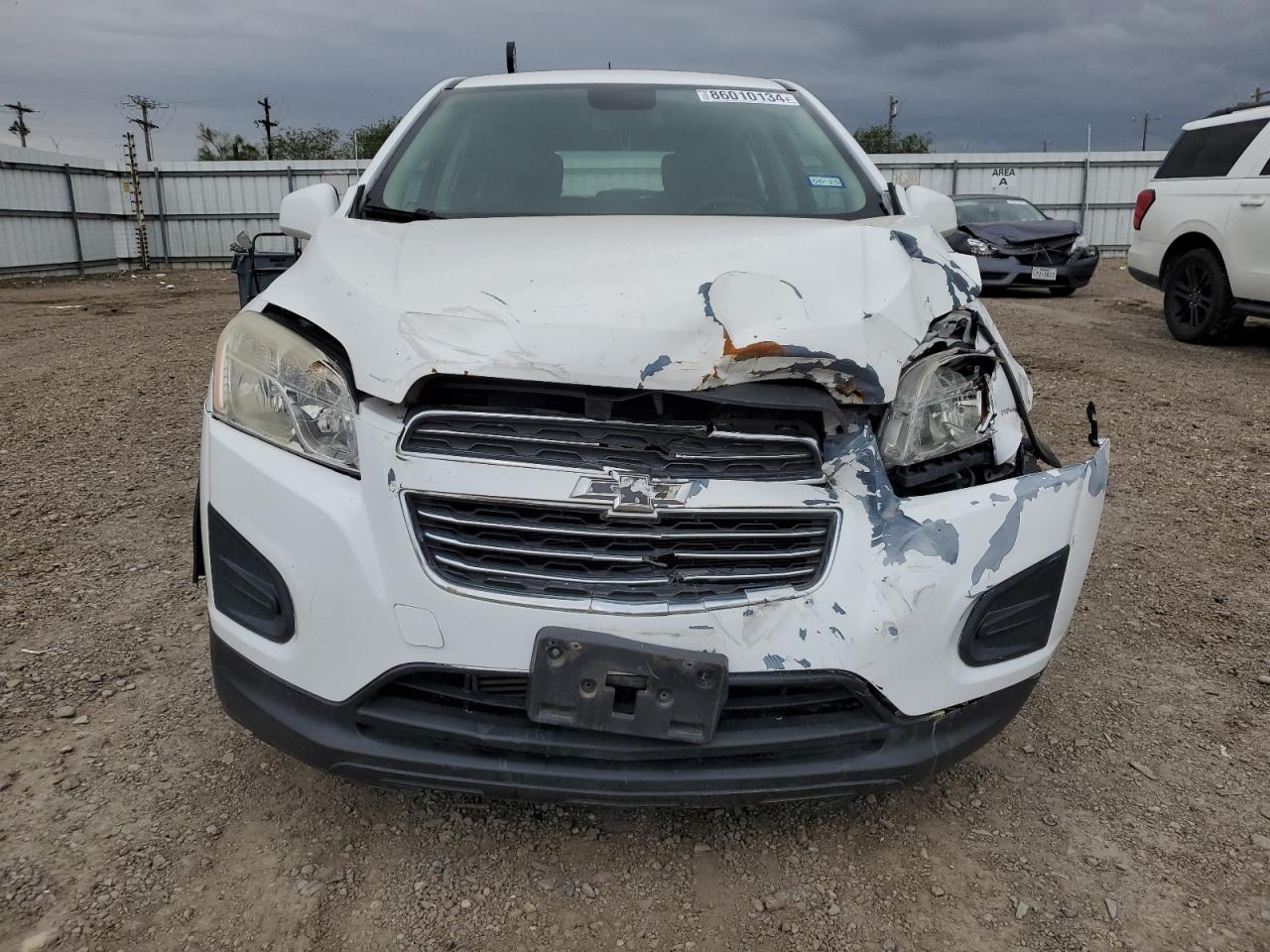 2015 Chevrolet Trax VIN 3GNCJKSB0FL242245 Copart auction photo, front end / rear end damage thumbnail 5