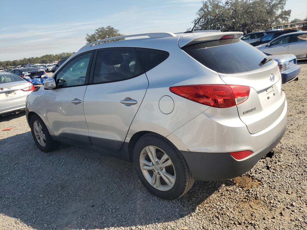 2012 Hyundai Tucson VIN KM8JU3AC5CU500747 Copart auction photo, vandalism damage thumbnail 2