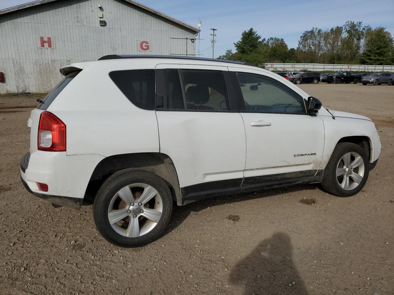 2012 Jeep Compass VIN 1C4NJCBB5CD634744 Copart auction photo, side / minor dent/scratches damage thumbnail 3