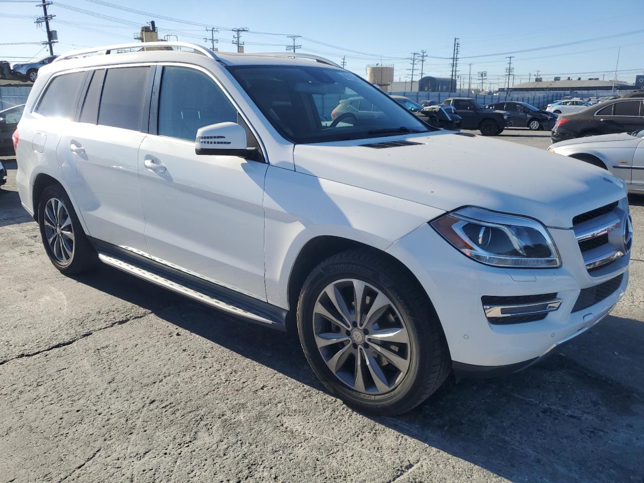 2015 Mercedes-Benz GL-klasse VIN 4JGDF2EE8FA530005 Copart auction photo, rear end / side damage thumbnail 4