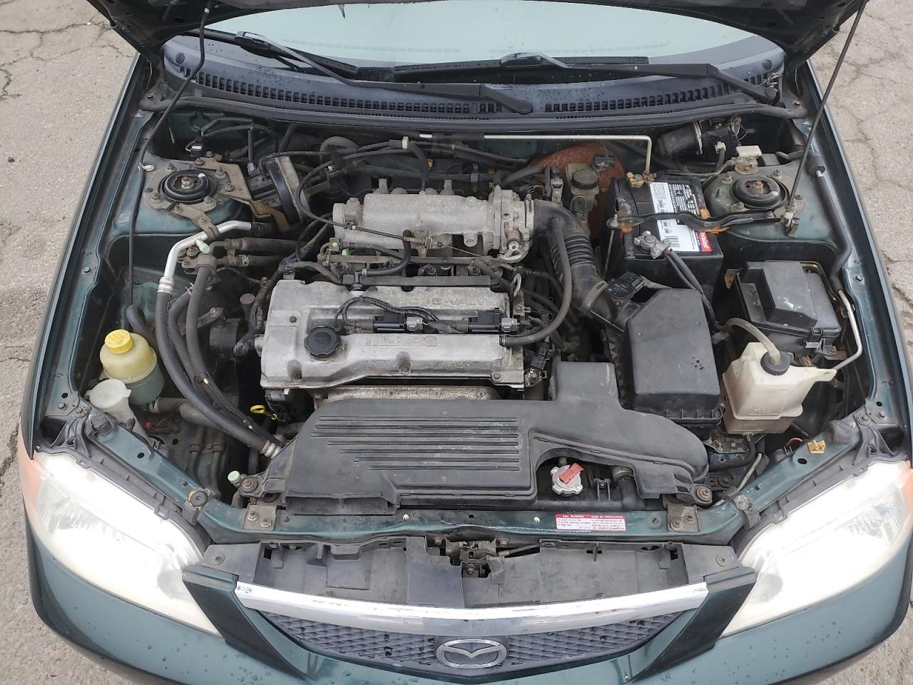 2001 Mazda Protege VIN JM1BJ222910404111 Copart auction photo, all over damage thumbnail 11