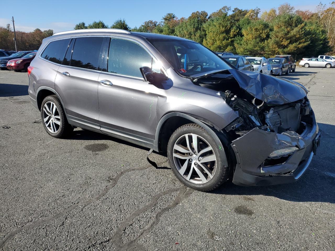 2017 Honda Pilot VIN 5FNYF6H91HB002585 Copart auction photo, front end / minor dent/scratches damage thumbnail 4