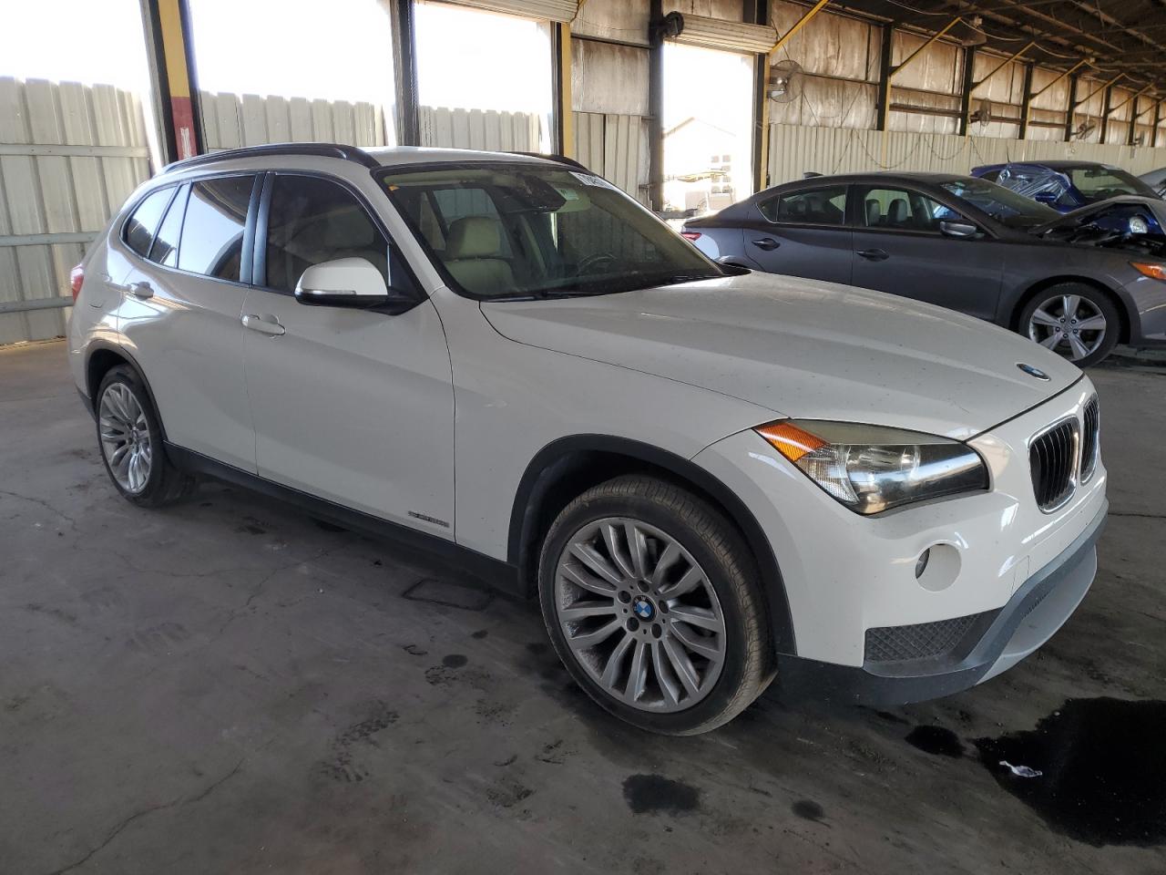 2014 BMW X1 VIN WBAVM1C54EVW50979 Copart auction photo, side / rear end damage thumbnail 4