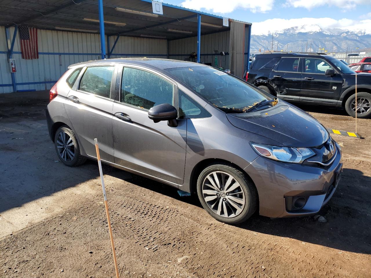 2015 Honda Fit VIN 3HGGK5G85FM770011 Copart auction photo, rear end damage thumbnail 4