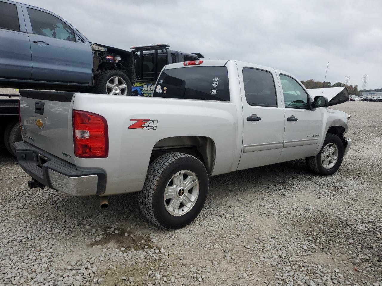2011 Chevrolet Silverado VIN 3GCPKSE32BG394445 Copart auction photo, front end damage thumbnail 3