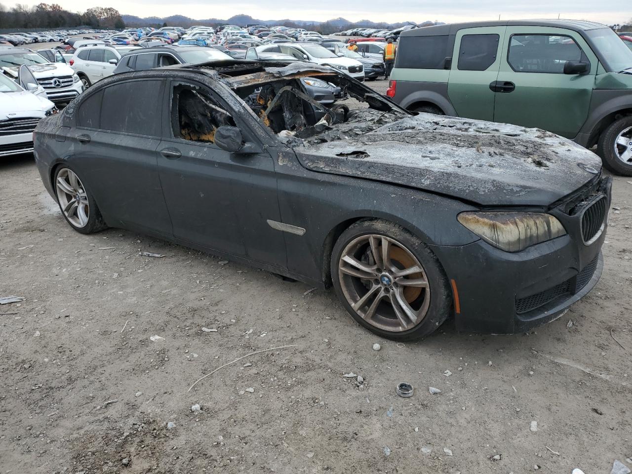 2013 BMW 7er VIN WBAYE4C50DD137454 Copart auction photo, burn damage thumbnail 4