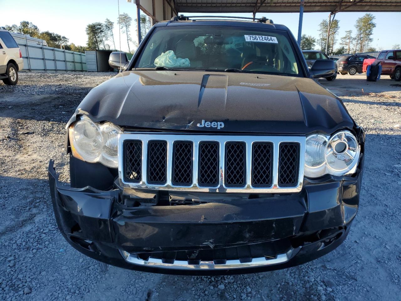 2009 Jeep Grand Cherokee VIN 1J8HR68TX9C540051 Copart auction photo, front end damage thumbnail 5