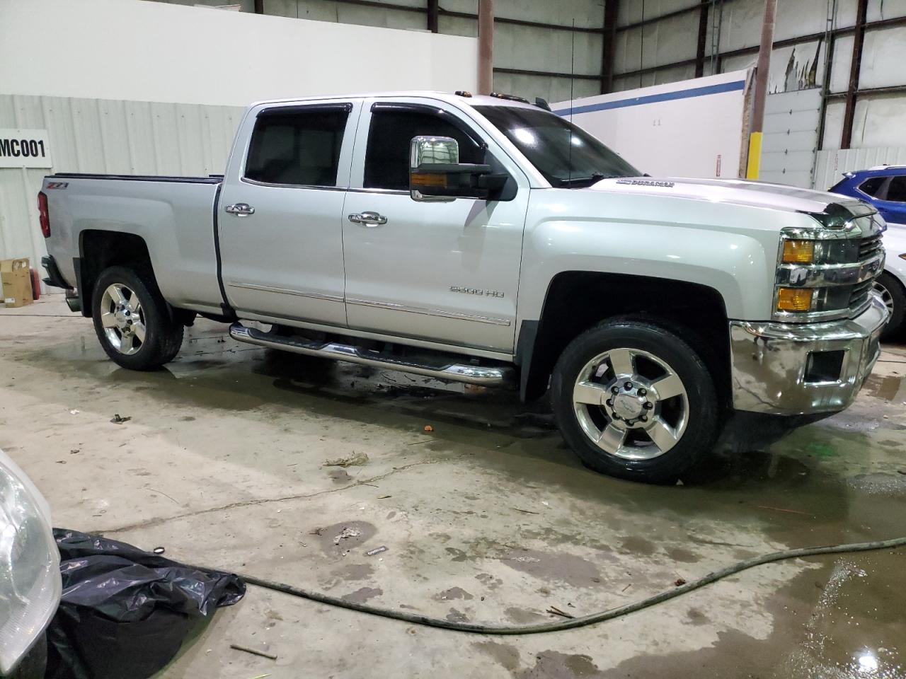 2016 Chevrolet Silverado VIN 1GC1KWE87GF103388 Copart auction photo, burn - engine damage thumbnail 4