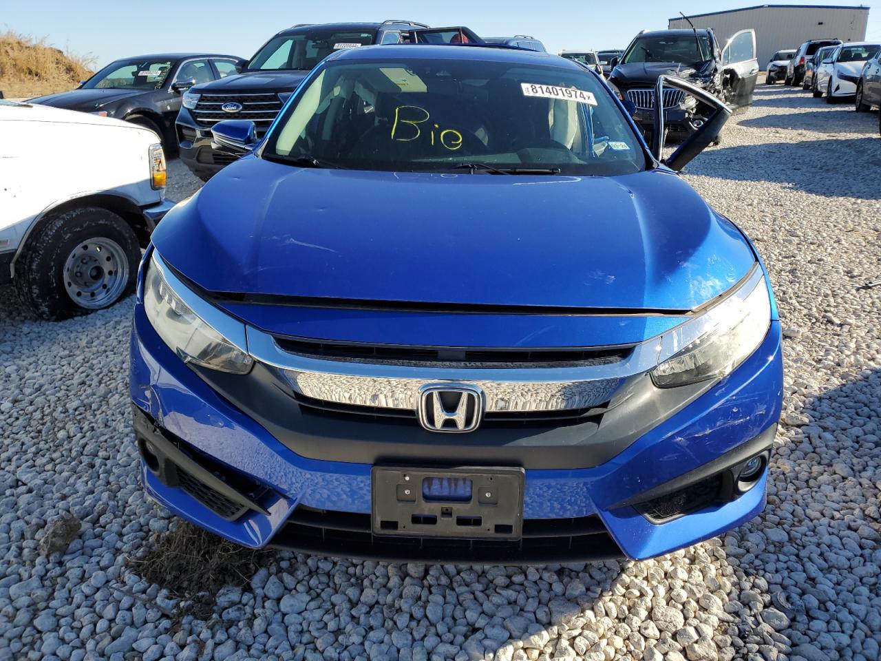 2016 Honda Civic VIN 19XFC1F91GE023396 Copart auction photo, all over damage thumbnail 5