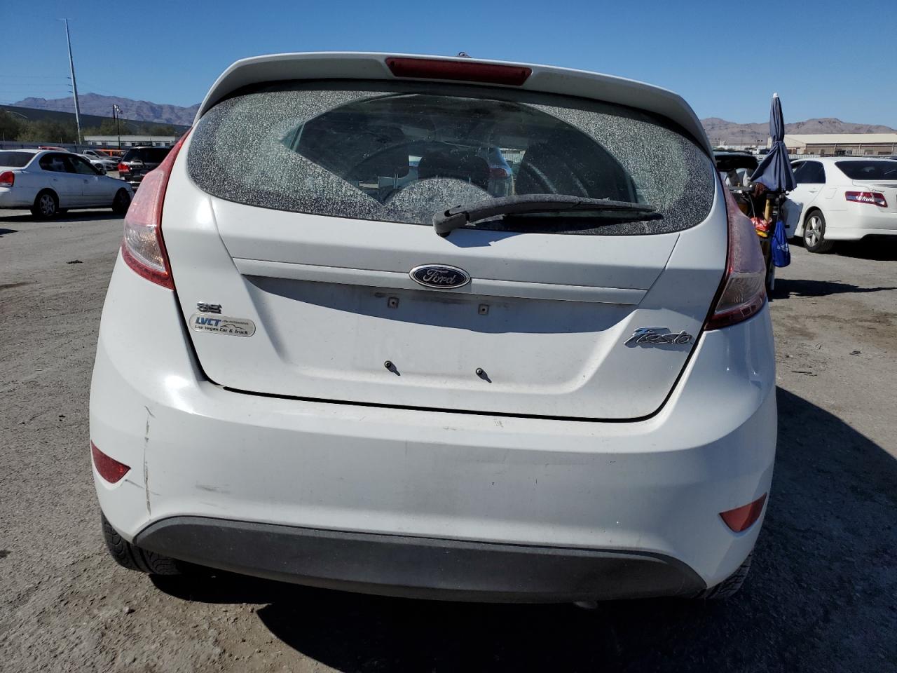 2015 Ford Fiesta VIN 3FADP4EJ6FM217246 Copart auction photo, all over damage thumbnail 6
