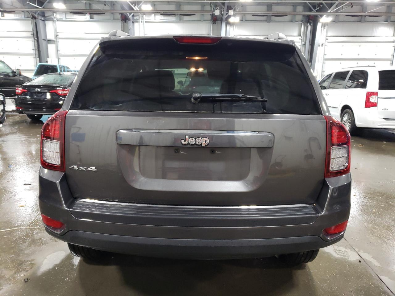 2014 Jeep Compass VIN 1C4NJDBB8ED828287 Copart auction photo, side / front end damage thumbnail 6