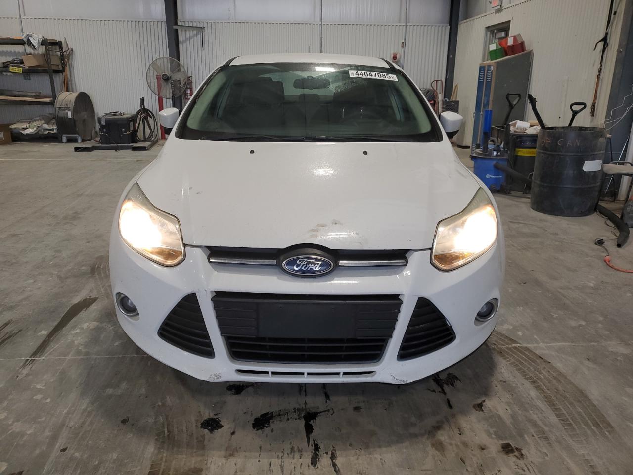 2012 Ford Focus VIN 1FAHP3F2XCL280057 Copart auction photo, undercarriage / side damage thumbnail 5