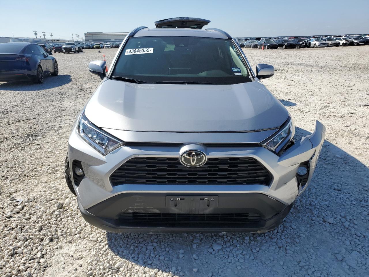 2021 Toyota RAV 4 VIN 2T3C1RFV2MC167755 Copart auction photo, side / front end damage thumbnail 5