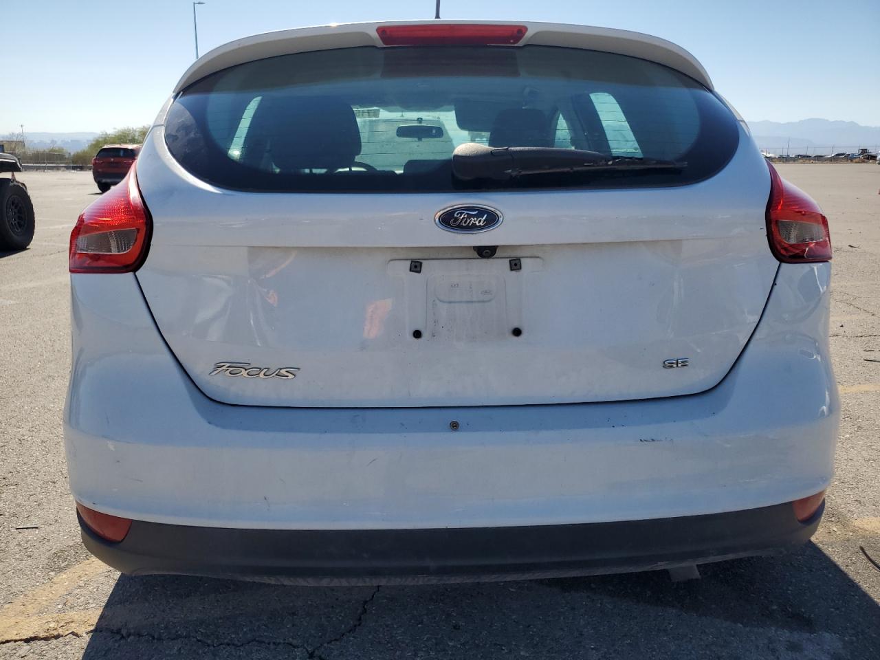 2016 Ford Focus VIN 1FADP3K2XGL270476 Copart auction photo, all over damage thumbnail 6