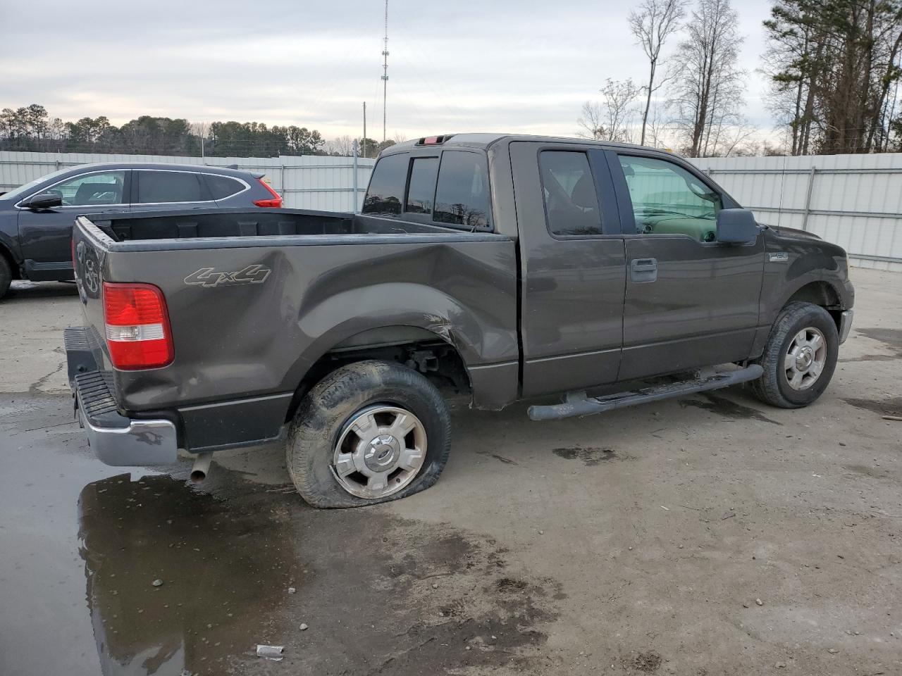 2006 Ford F-150 VIN 1FTPX14506FA01323 Copart auction photo, side / rear end damage thumbnail 3