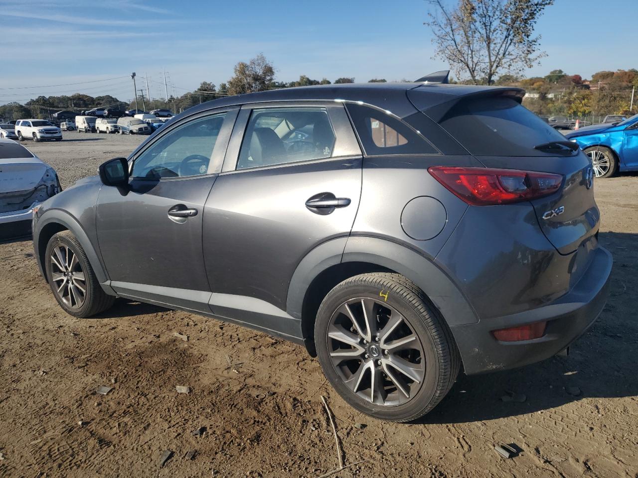 2018 Mazda CX-3 VIN JM1DKDC79J1324989 Copart auction photo, side / minor dent/scratches damage thumbnail 2