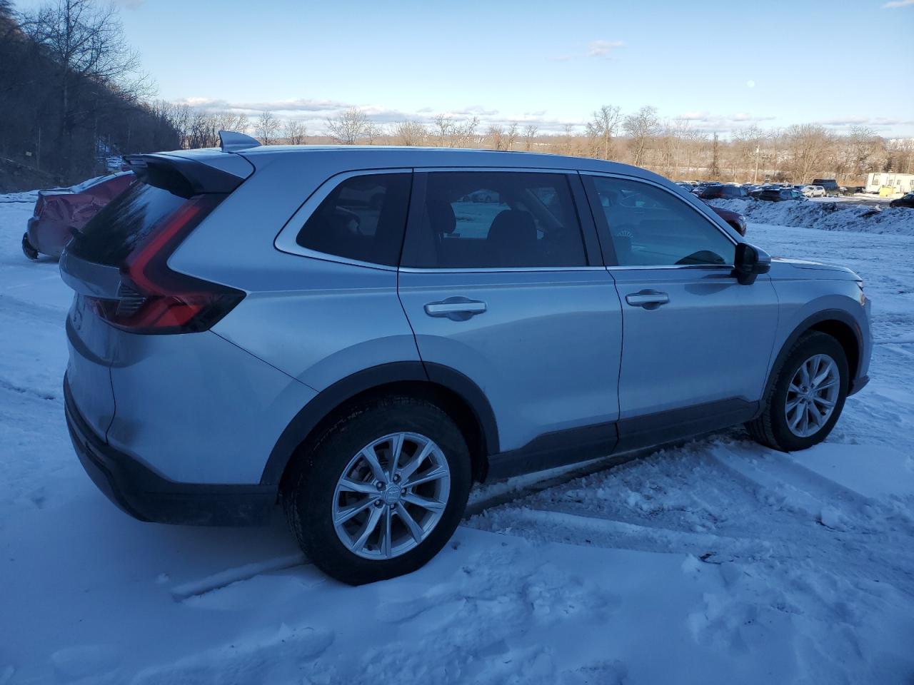 2023 Honda CR-V VIN 2HKRS4H40PH420192 Copart auction photo, side / minor dent/scratches damage thumbnail 3