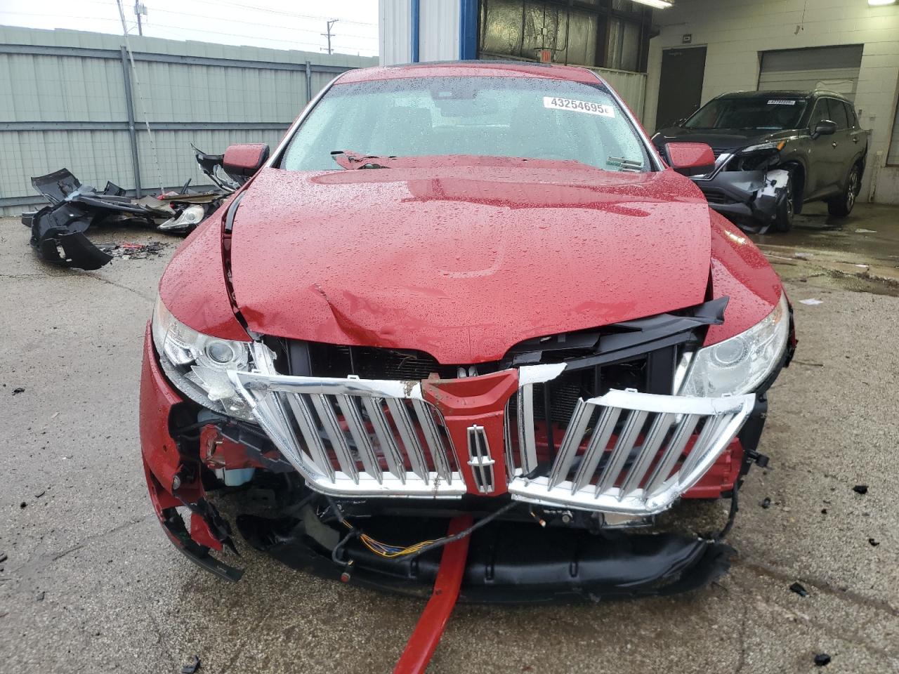 2009 Lincoln MKS VIN 1LNHM94R09G618830 Copart auction photo, front end damage thumbnail 5