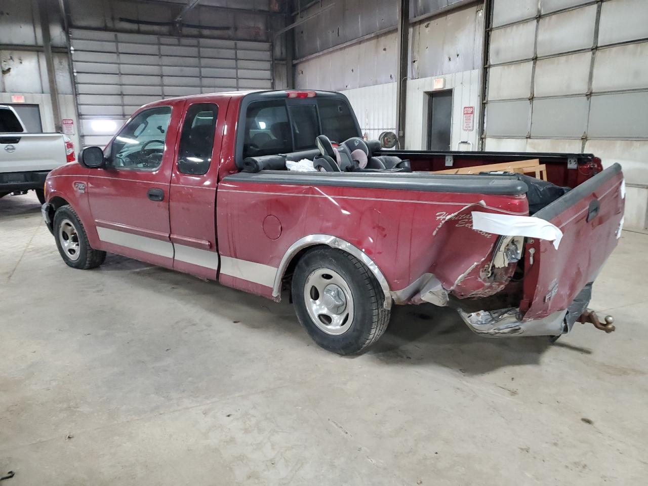 2004 Ford F-150 VIN 2FTRX17W54CA29897 Copart auction photo, rear end / undercarriage damage thumbnail 2