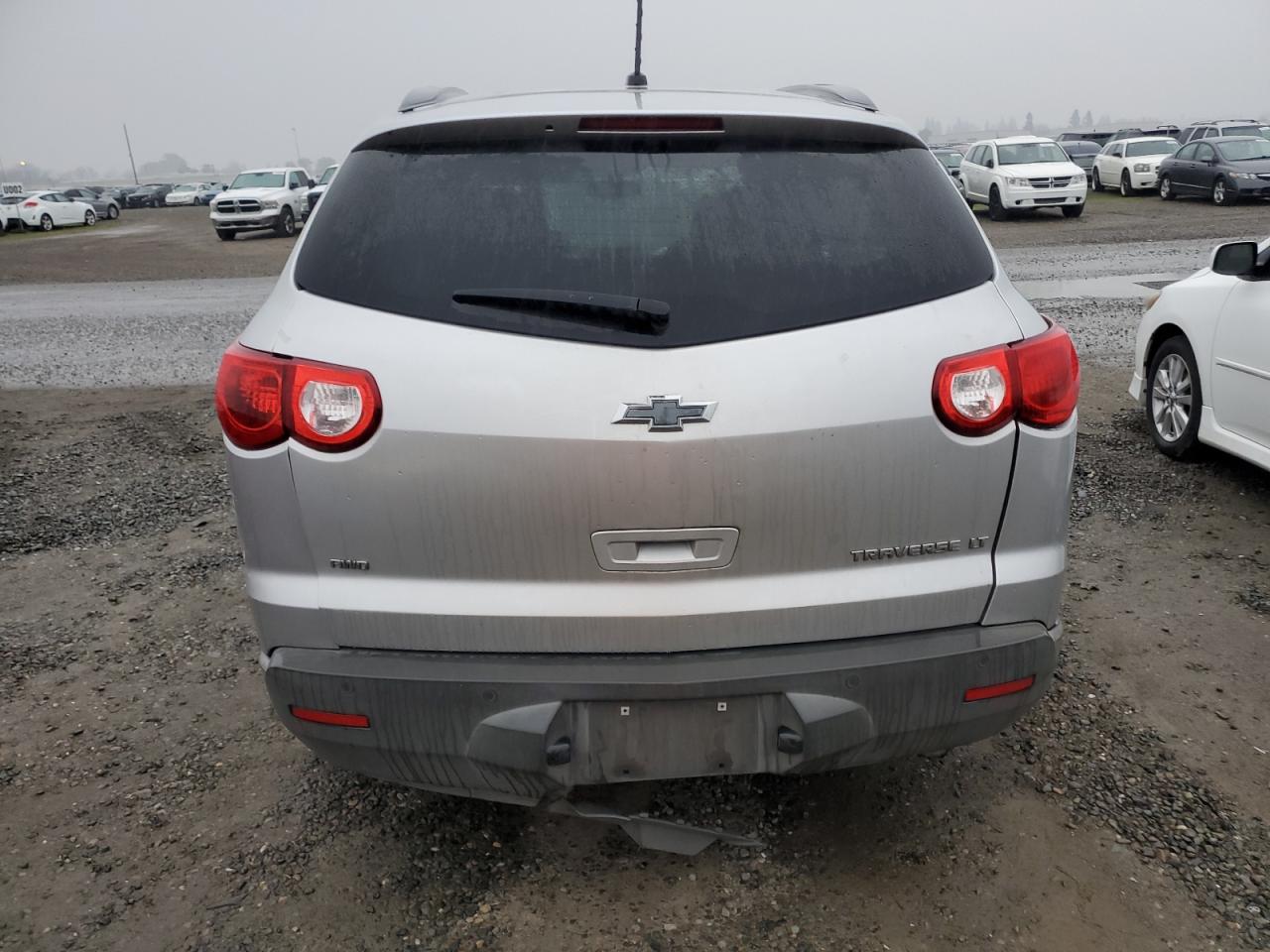 2012 Chevrolet Traverse VIN 1GNKVGED9CJ139760 Copart auction photo, all over damage thumbnail 6