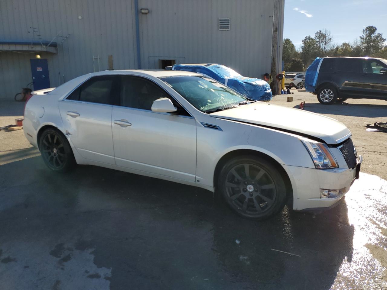 2009 Cadillac CTS VIN 1G6DJ577990146489 Copart auction photo, all over damage thumbnail 4