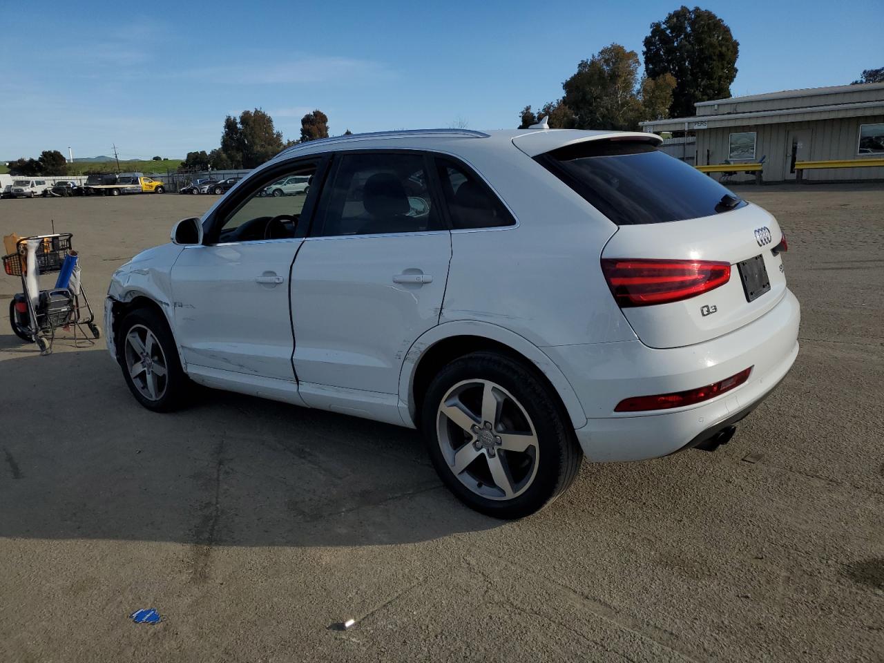 2015 Audi Q3 VIN WA1EFCFS5FR008916 Copart auction photo, front end / side damage thumbnail 2