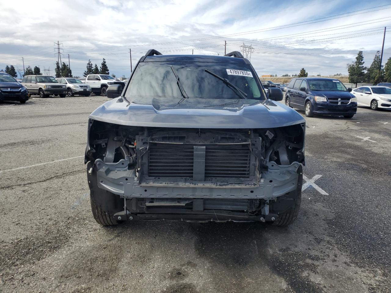 2022 Ford Bronco Sport VIN 3FMCR9C66NRE28732 Copart auction photo, front end / side damage thumbnail 5