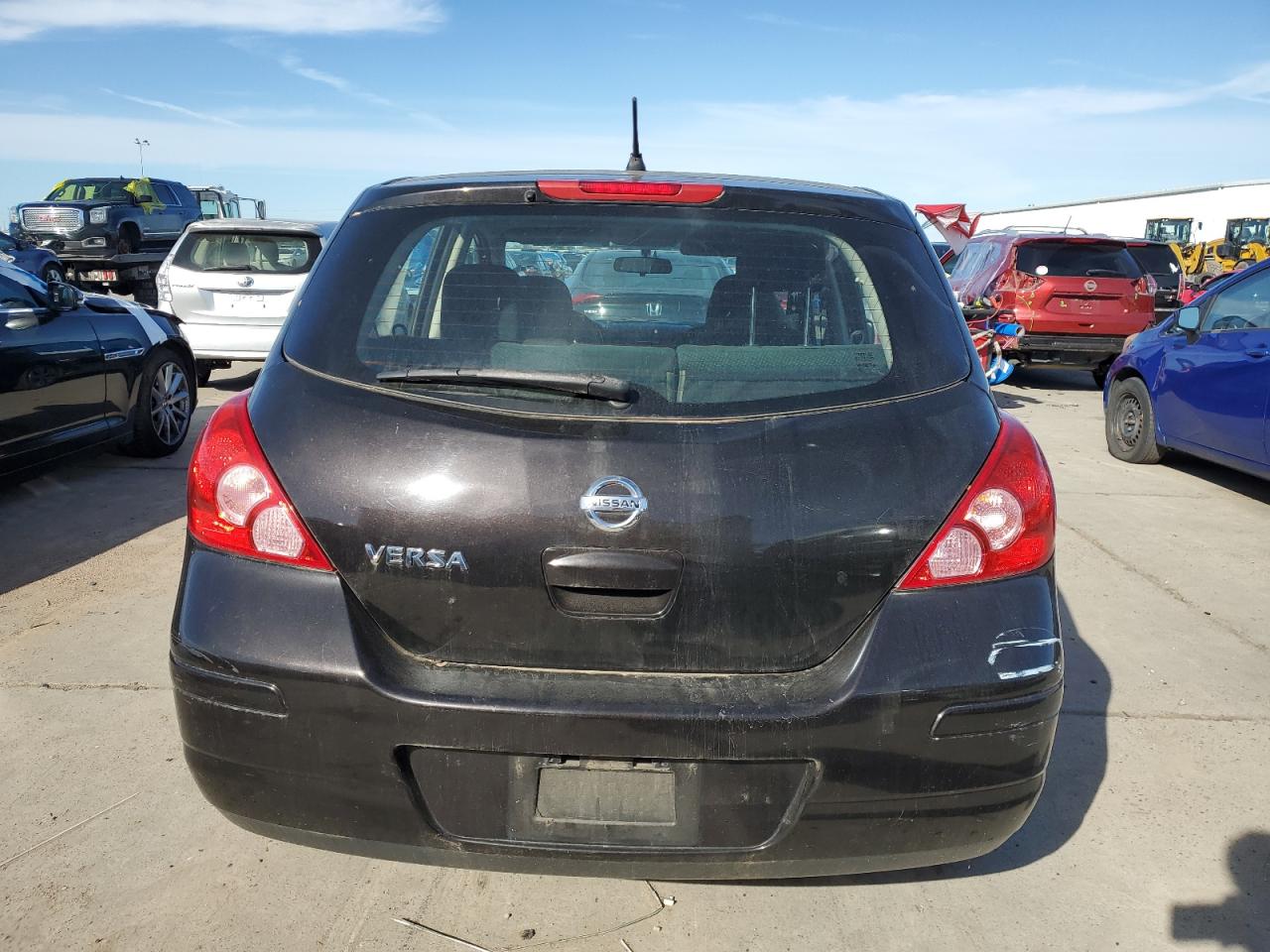 2012 Nissan Versa VIN 3N1BC1CP2CK231044 Copart auction photo, side damage thumbnail 6