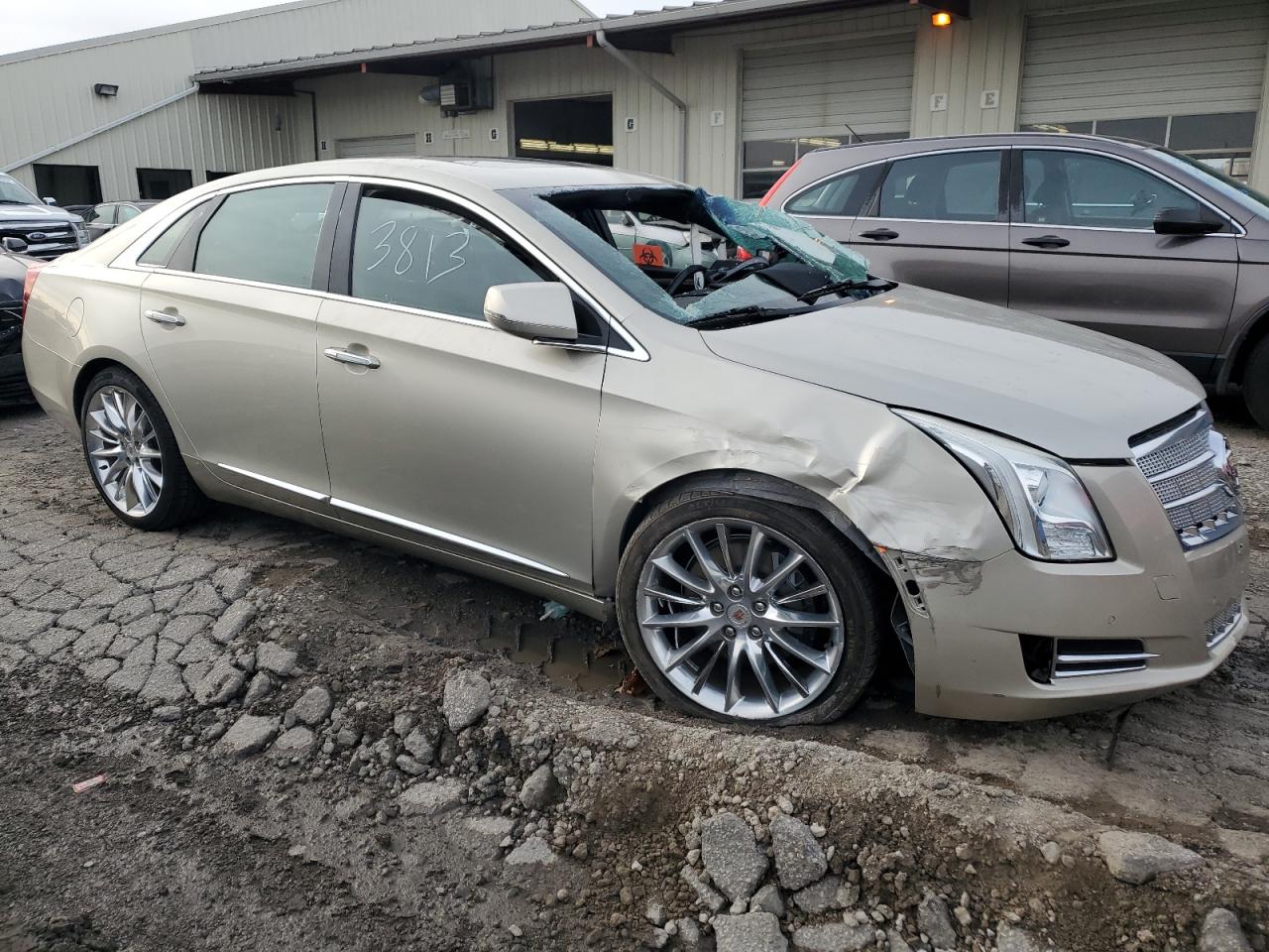 2013 Cadillac XTS VIN 2G61V5S39D9183813 Copart auction photo, front end / side damage thumbnail 4