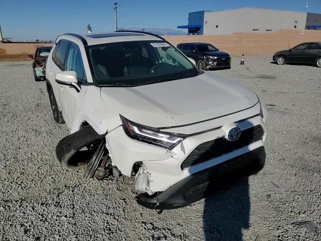 2022 Toyota RAV 4 VIN 4T3B6RFV3NU094800 Copart auction photo, front end / side damage thumbnail 12