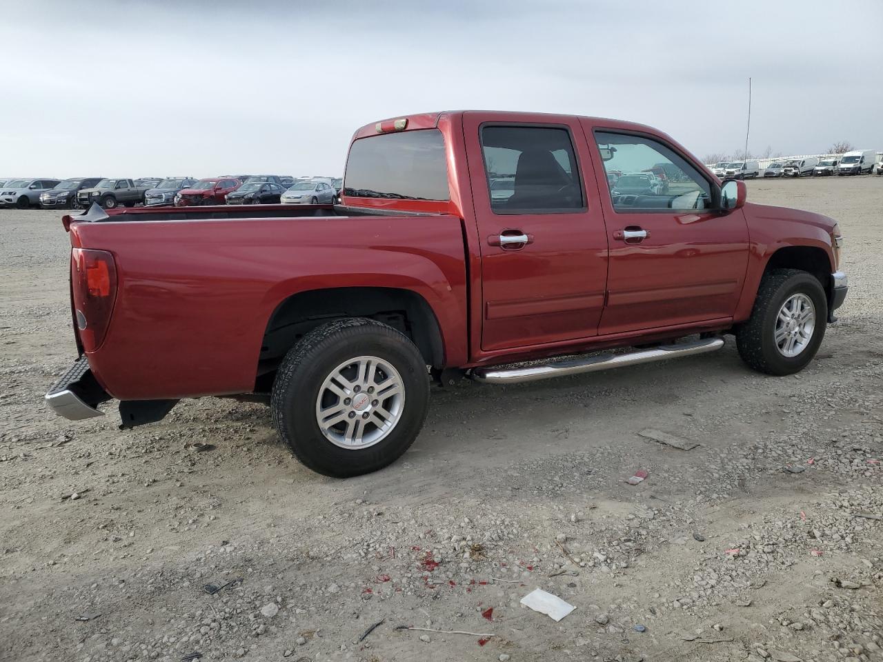 2011 GMC Canyon VIN 1GTH6MFE5B8134177 Copart auction photo, rear end damage thumbnail 3