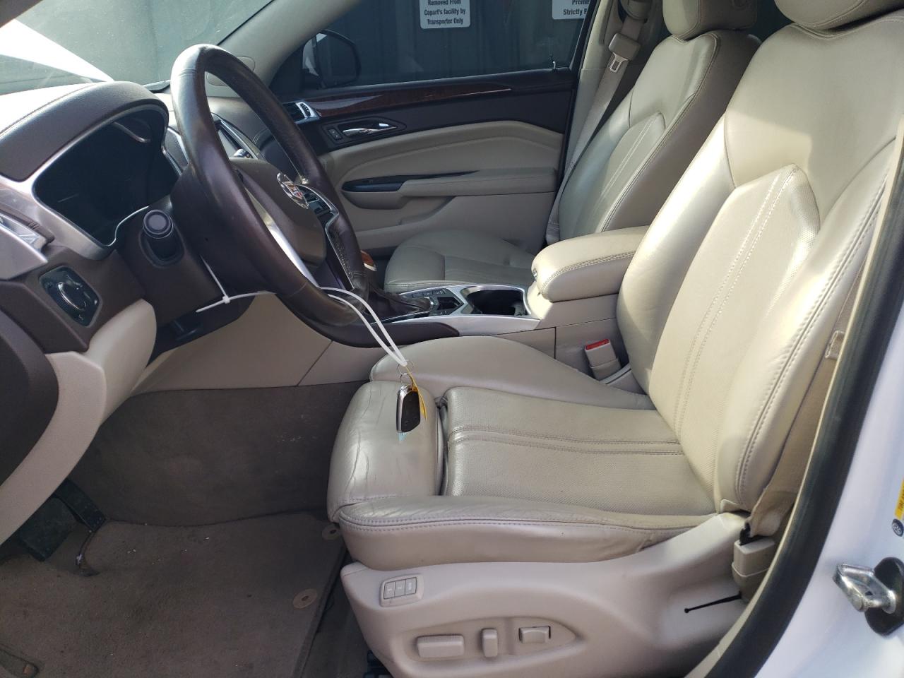 2016 Cadillac SRX VIN 3GYFNBE3XGS572877 Copart auction photo, front end / minor dent/scratches damage thumbnail 7