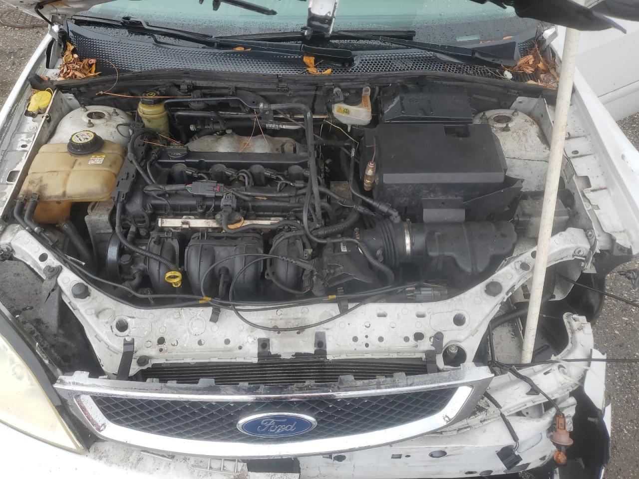 2005 Ford Focus VIN 1FAFP34N75W285819 Copart auction photo, front end damage thumbnail 11