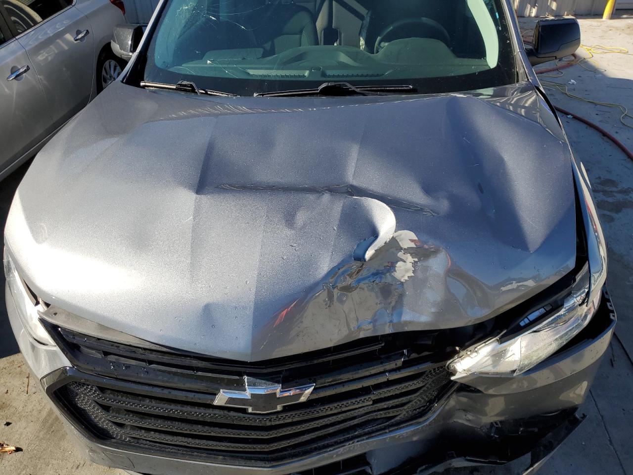 2021 Chevrolet Traverse VIN 1GNERFKW4MJ245004 Copart auction photo, side / front end damage thumbnail 12