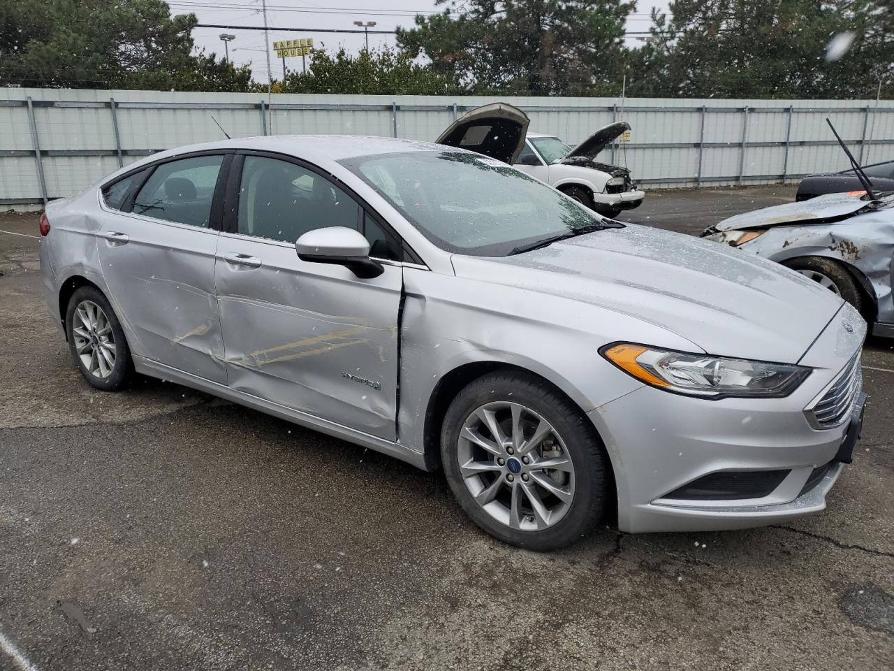 2017 Ford Fusion VIN 3FA6P0LU5HR316306 Copart auction photo, all over damage thumbnail 4