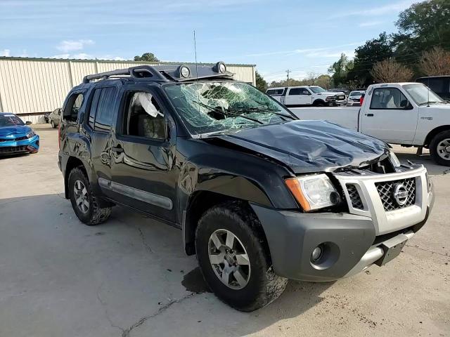 2011 Nissan XTerra VIN 5N1AN0NW8BC524674 Copart auction photo, all over damage thumbnail 11