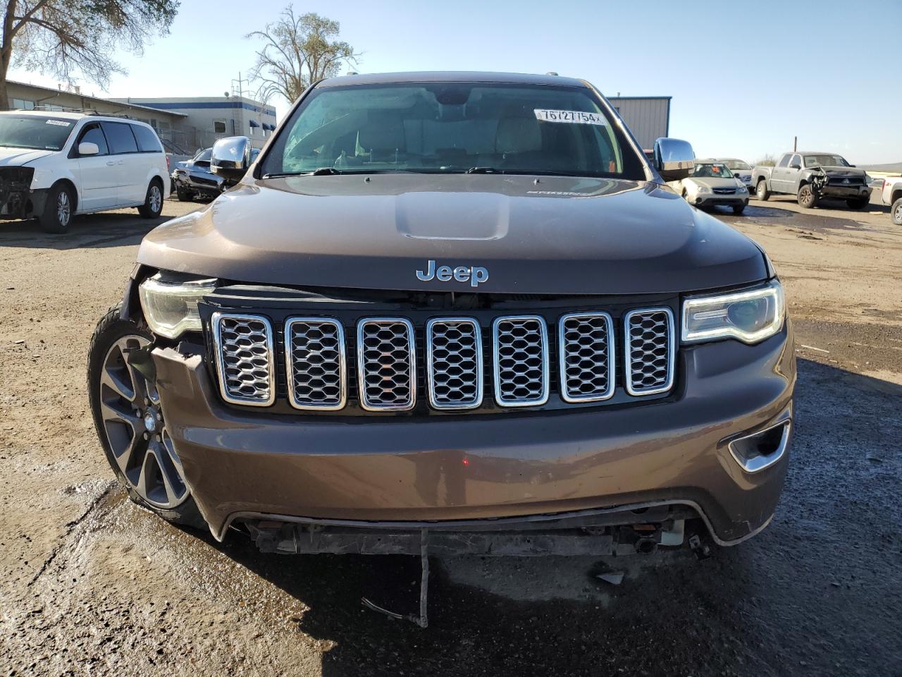 2017 Jeep Grand Cherokee VIN 1C4RJFCG7HC771985 Copart auction photo, front end damage thumbnail 5