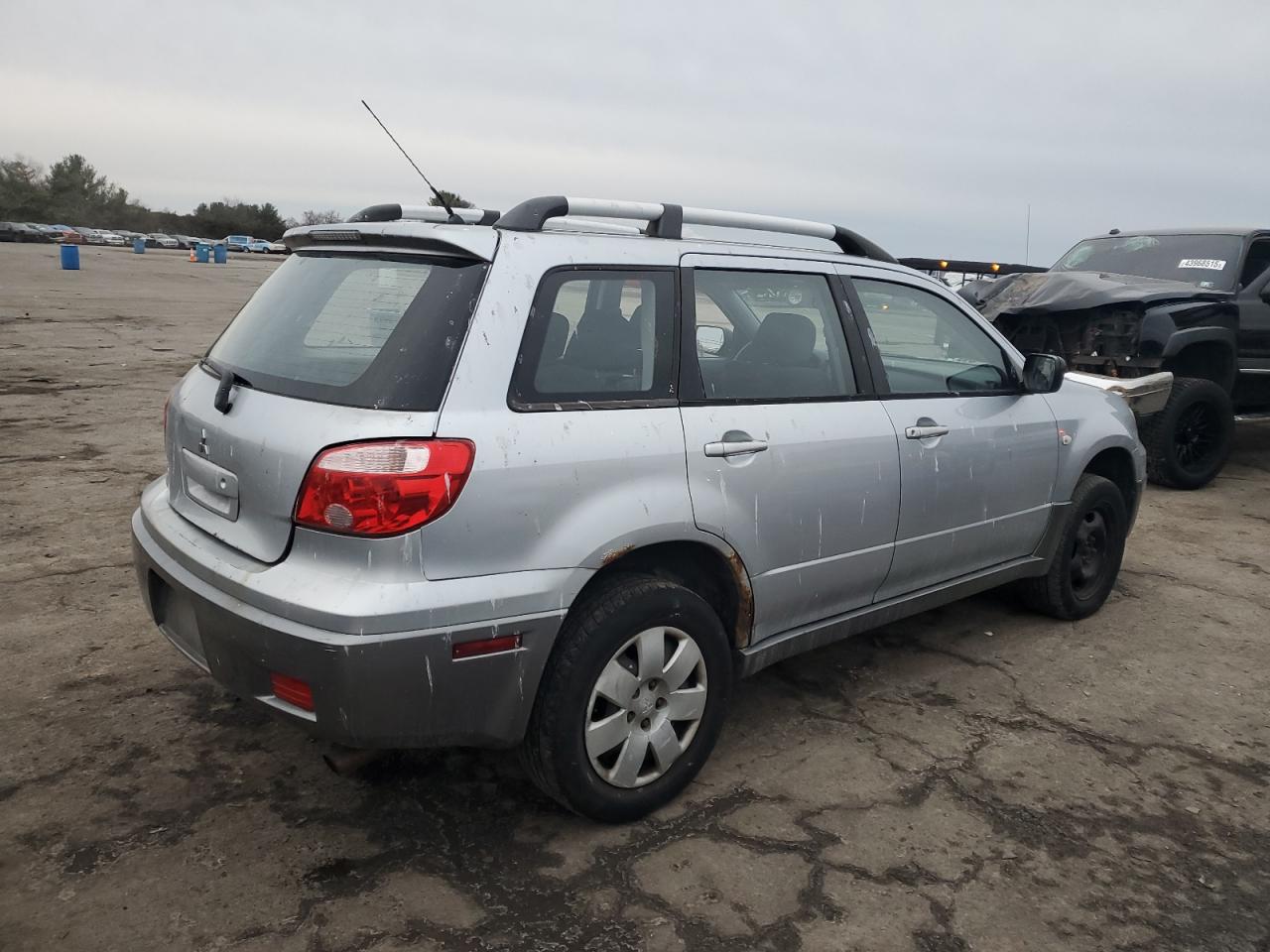 2006 Mitsubishi Outlander VIN JA4LZ31F26U037182 Copart auction photo, side damage thumbnail 3