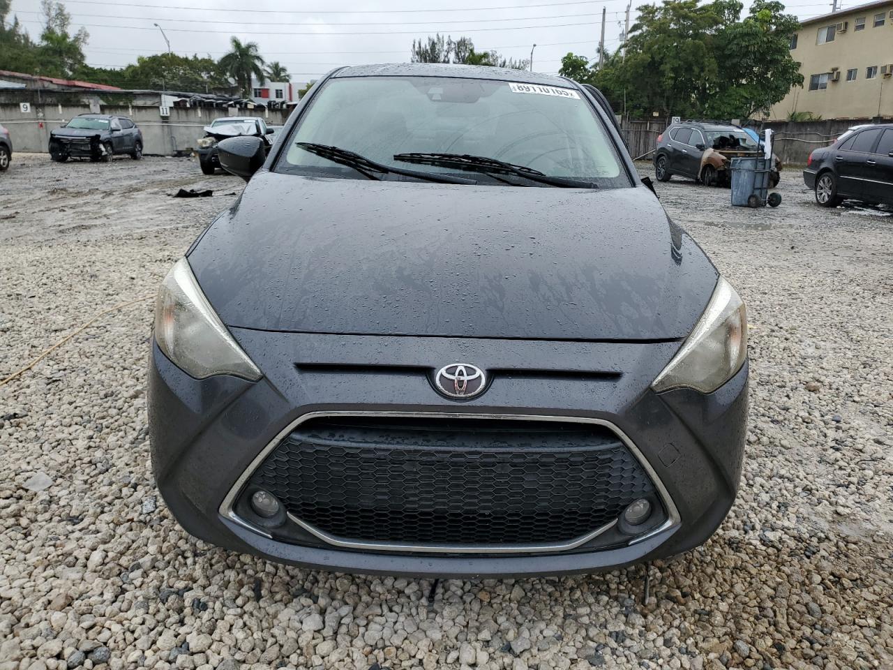2019 Toyota Yaris VIN 3MYDLBYV5KY505451 Copart auction photo, side / minor dent/scratches damage thumbnail 5