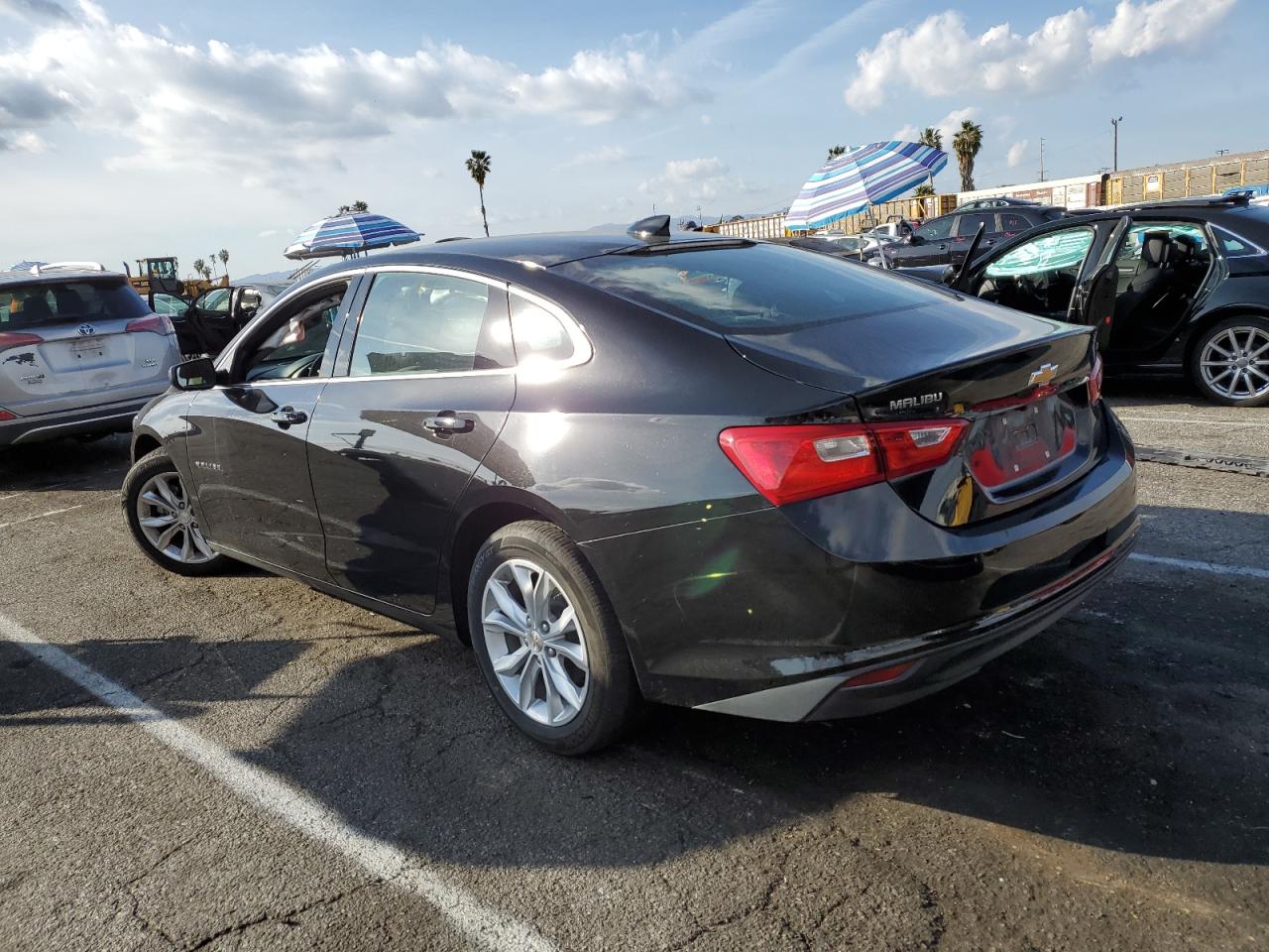 2023 Chevrolet Malibu VIN 1G1ZD5ST3PF202752 Copart auction photo, side / minor dent/scratches damage thumbnail 2