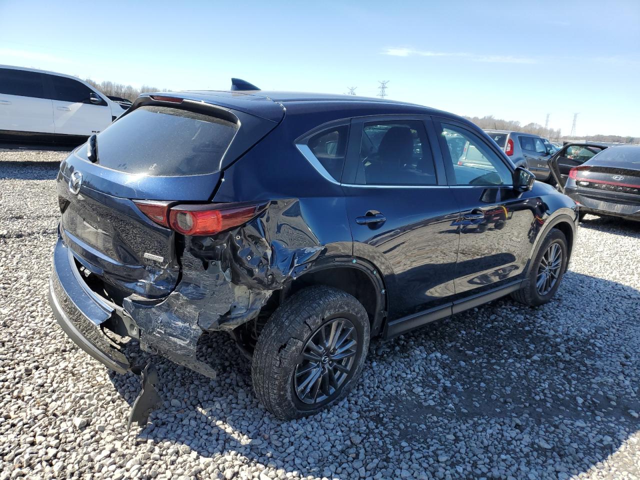 2019 Mazda CX-5 VIN JM3KFACM5K0527960 Copart auction photo, rear end damage thumbnail 3
