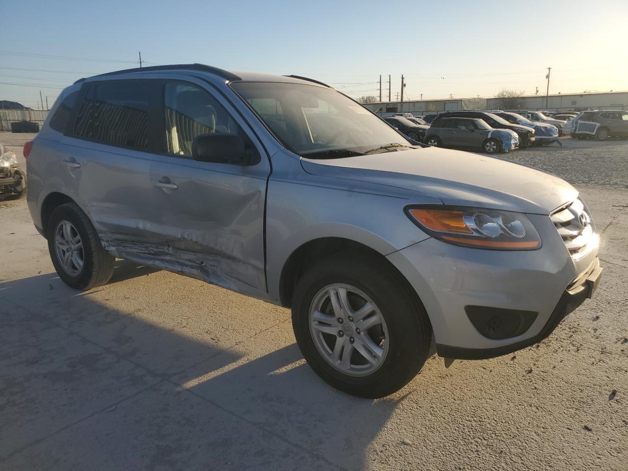 2010 Hyundai Santa Fe VIN 5NMSG3AB6AH394823 Copart auction photo, side / minor dent/scratches damage thumbnail 4