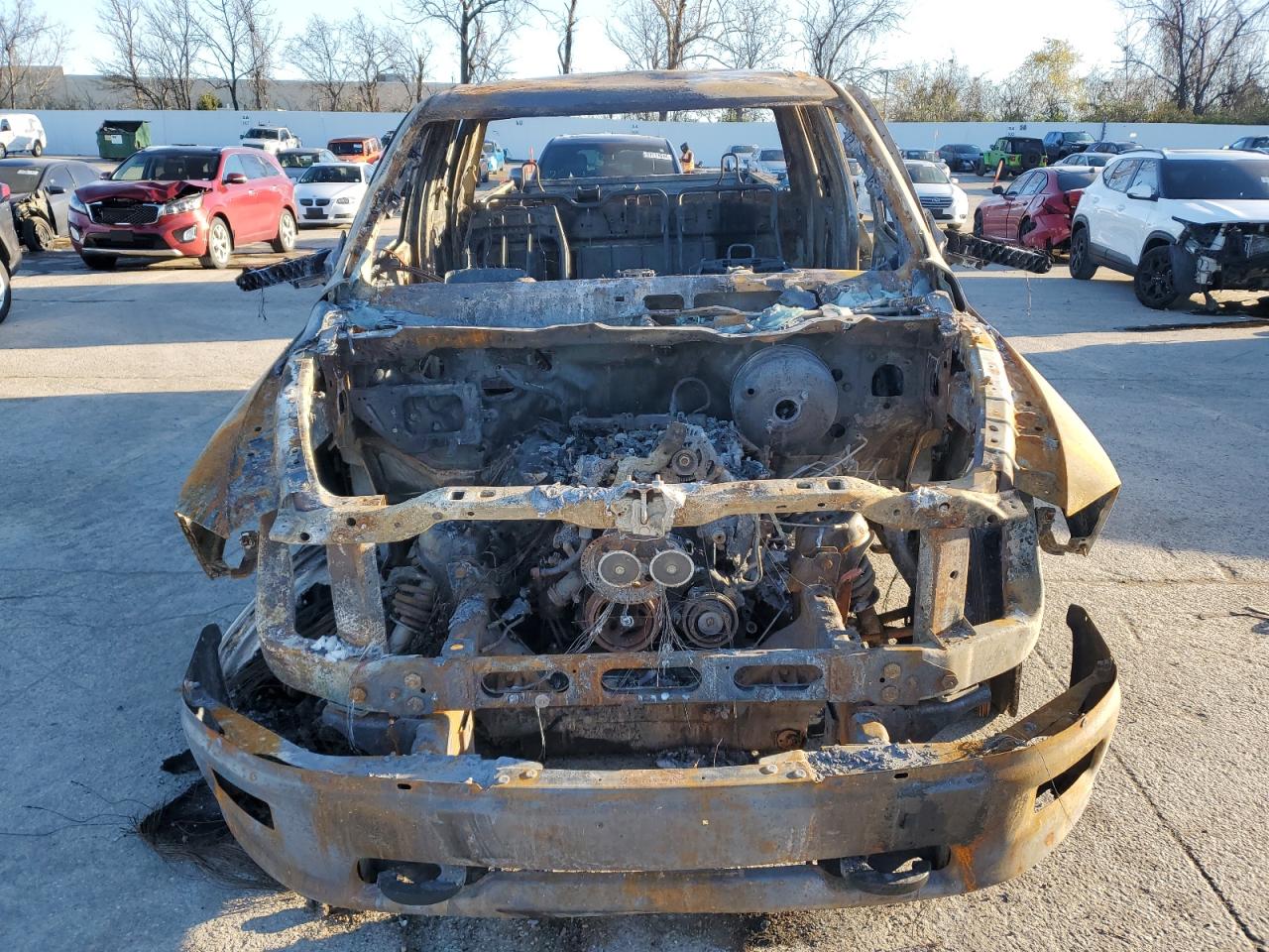 2012 Dodge RAM VIN 1C6RD7GT9CS254326 Copart auction photo, burn damage thumbnail 5